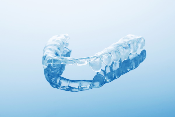 night dental guard by bruxism, on blue background